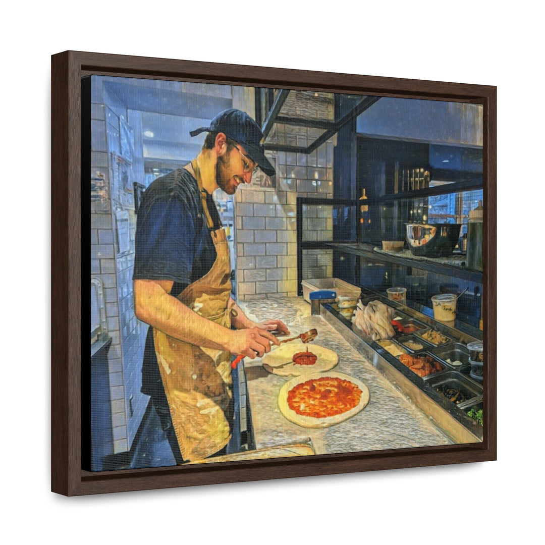 Chef at Restaurant 900 in Bromont, Quebec, crafting pizza in a wooden-framed artwork. - Bromont Media